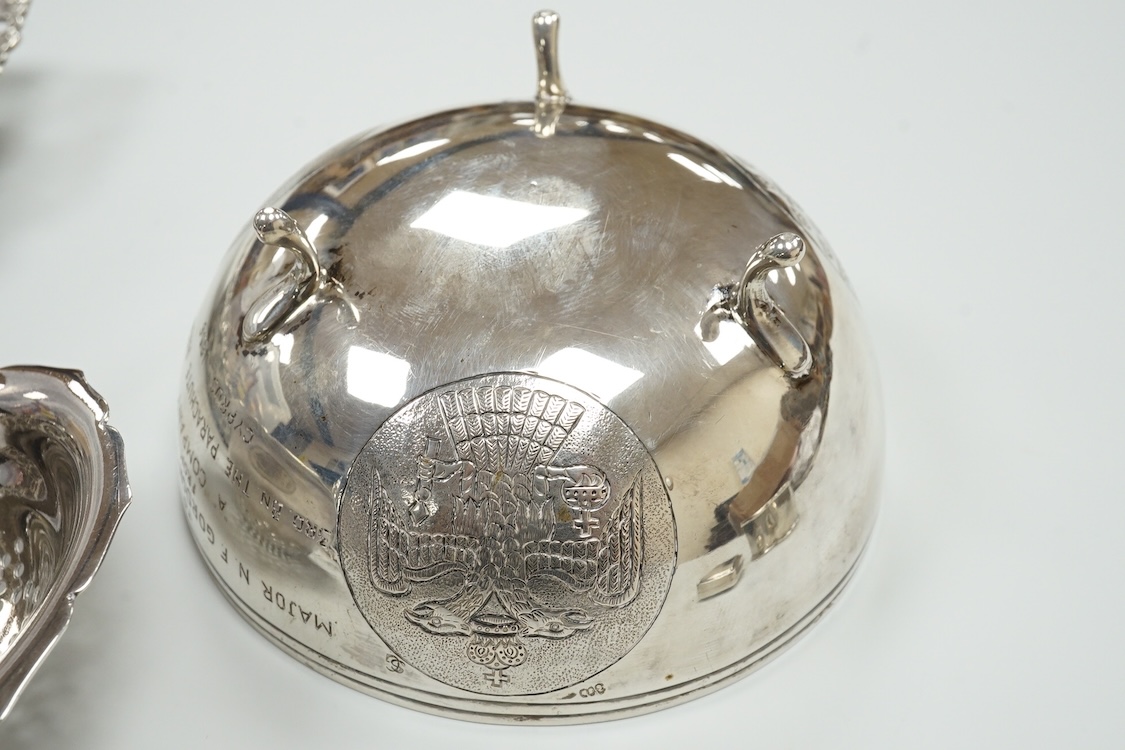 A late Victorian repousse silver navette shaped dish, by Charles Edwards, London, 1894, 25.7cm, with engraved monogram and date, together with a pair of mid 18th century silver sugar nips, an early 19th century silver vi